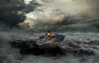 An old boat on the sea at night during a storm.